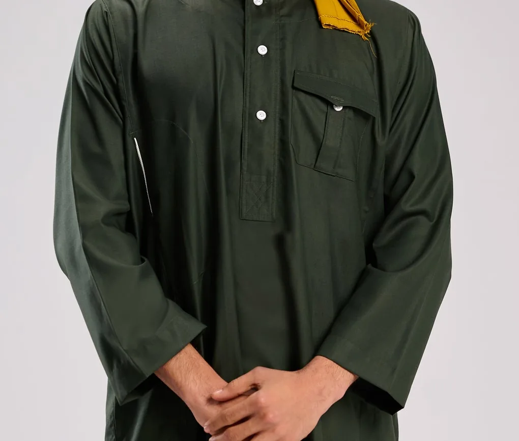 Placket, buttons, and chest-pocket detail on a plain dark-green thobe.